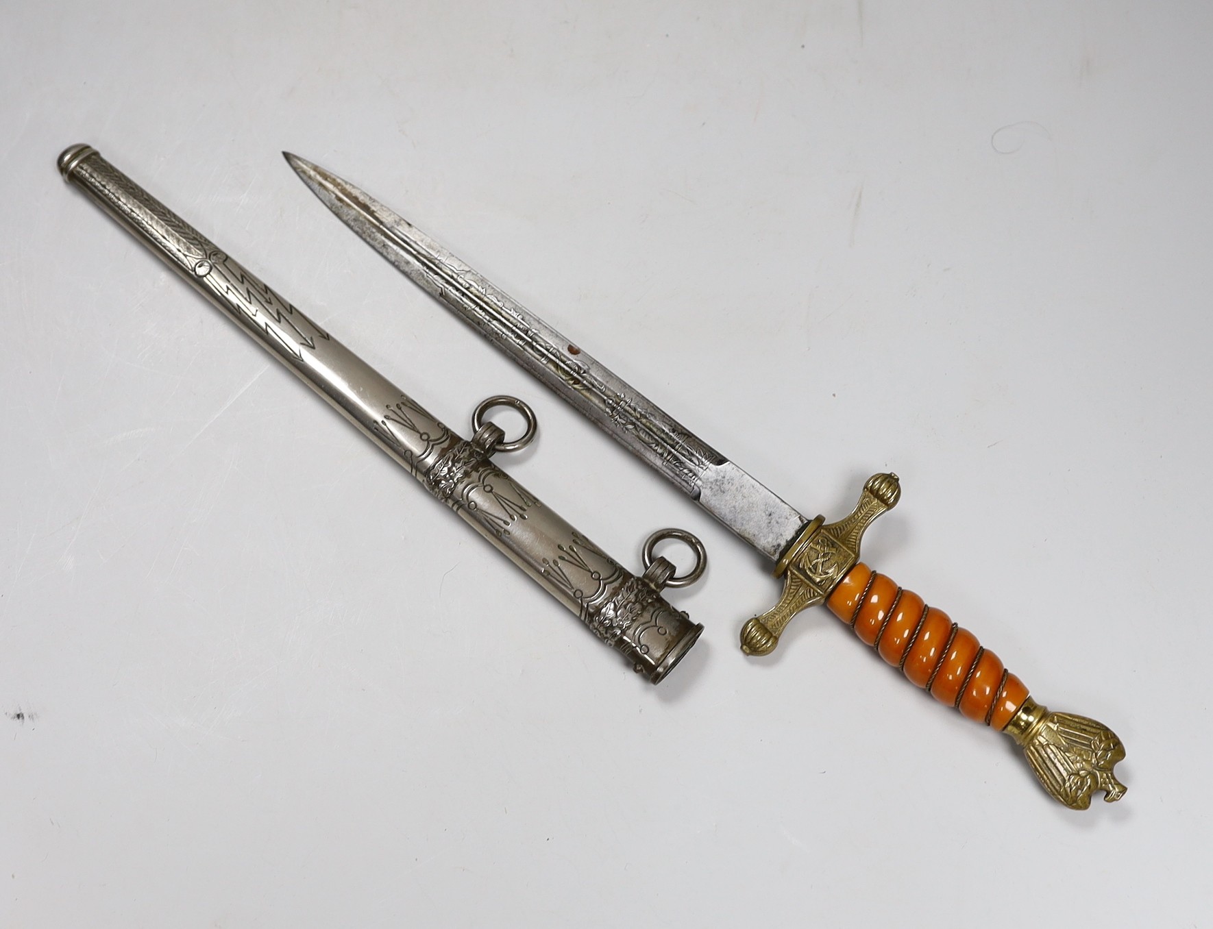 A German Kriegsmarine Officers dagger, by Eickhorn, Solingen, with associated German scabbard 41.5 cm